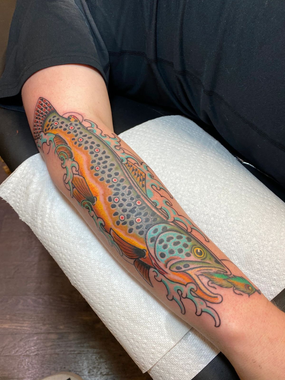 fish tattoo on forearm